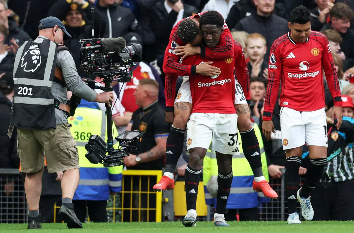 Manchester United Edge Liverpool in Thrilling Encounter to Secure Champions League Spot